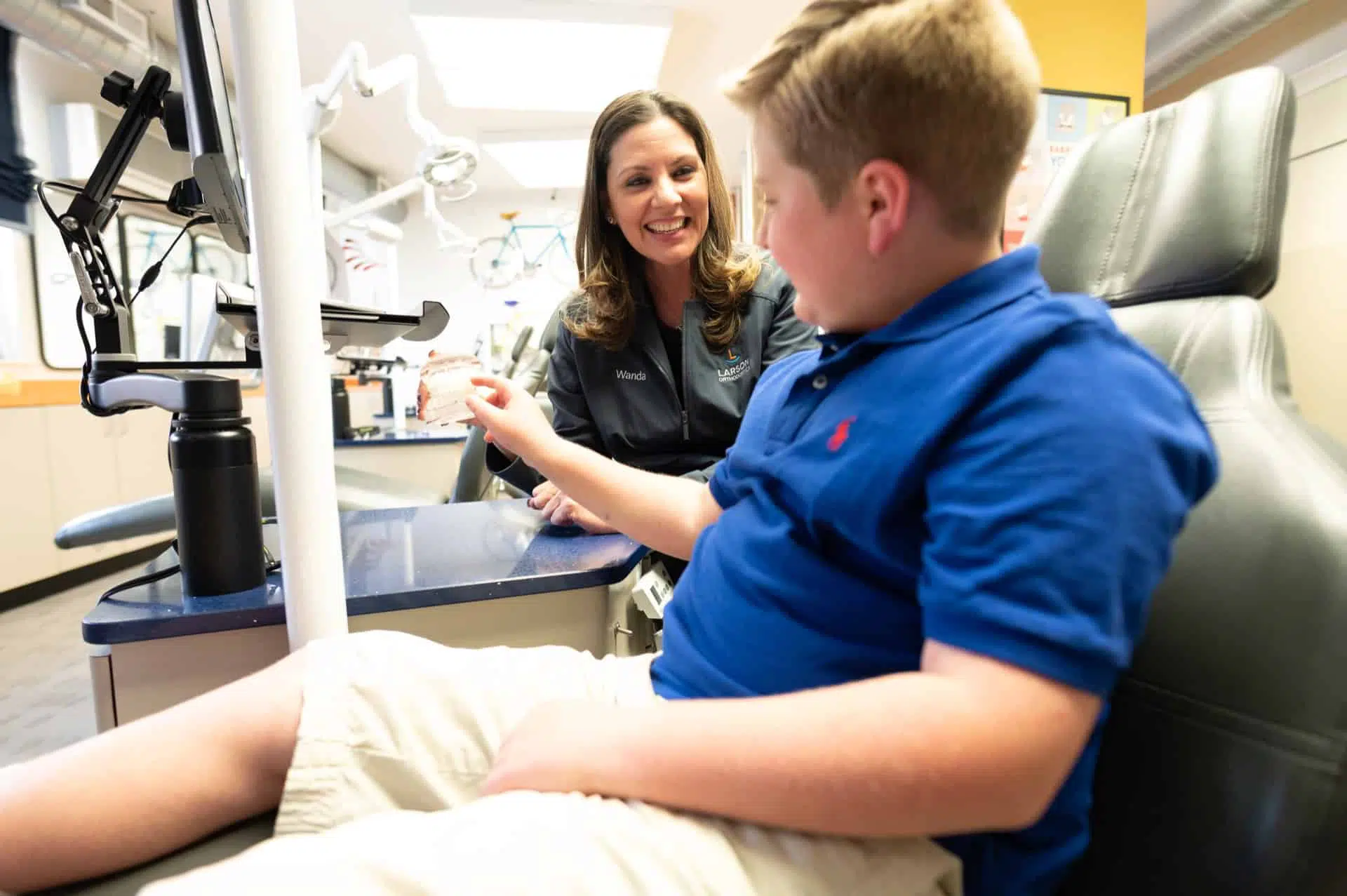 How Do Rubber Bands Help With My Braces? Larson Orthodontics Alexandria, VA Braces and Invisalign Staff Candids Larson Orthodontics Alexandria Virginia 2021 184 - How Do Rubber Bands Help With My Braces?